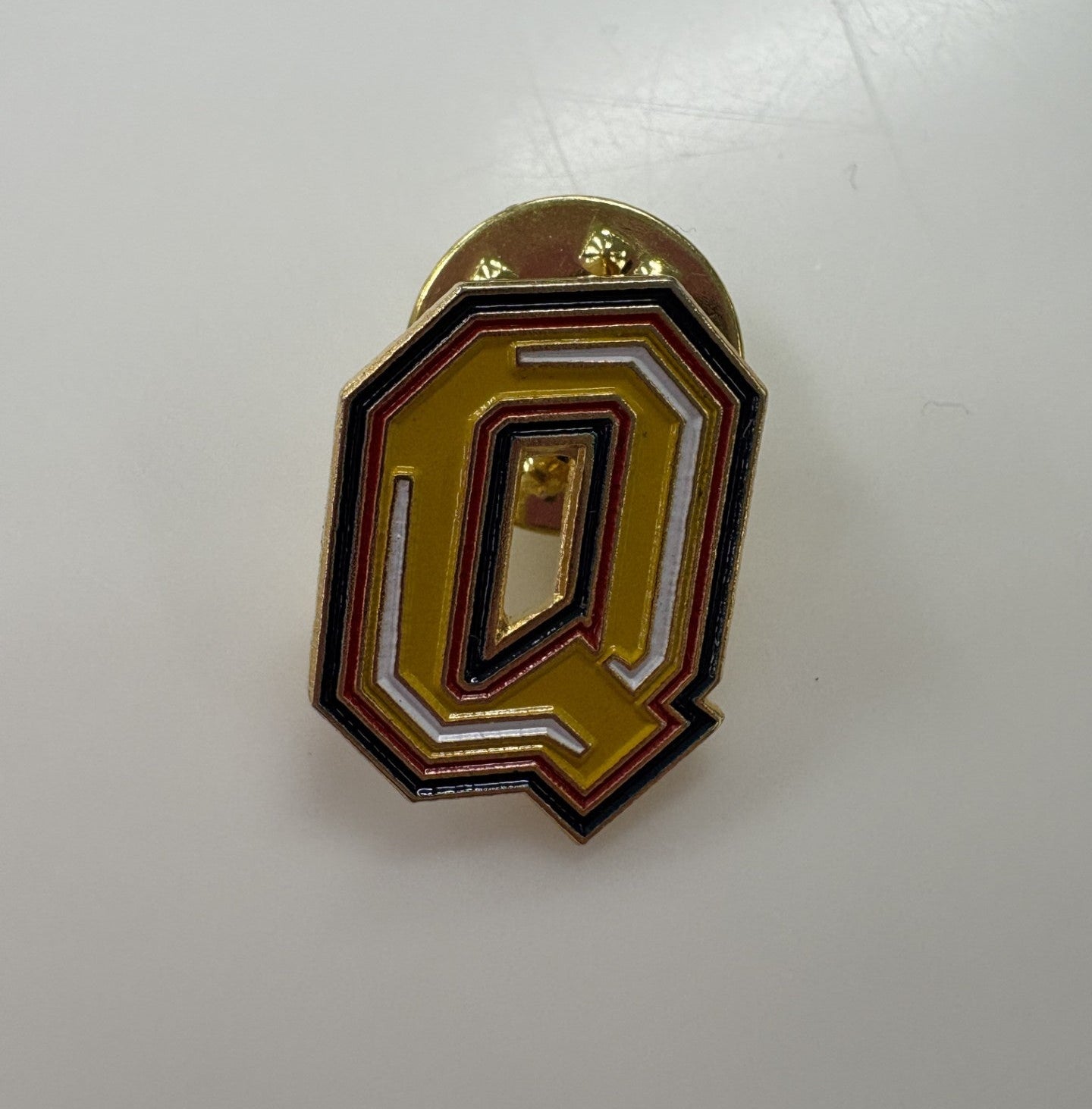Q Pins